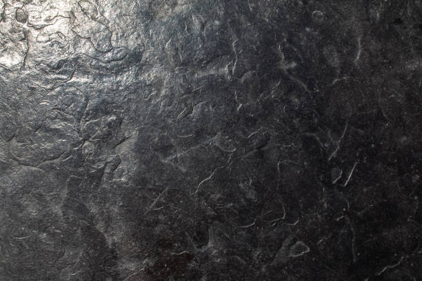 istock Classic black and grey patterned and uneven textured wall for background. 2169242696