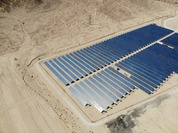 istock Solar panels power station desert aerial view 2169243689