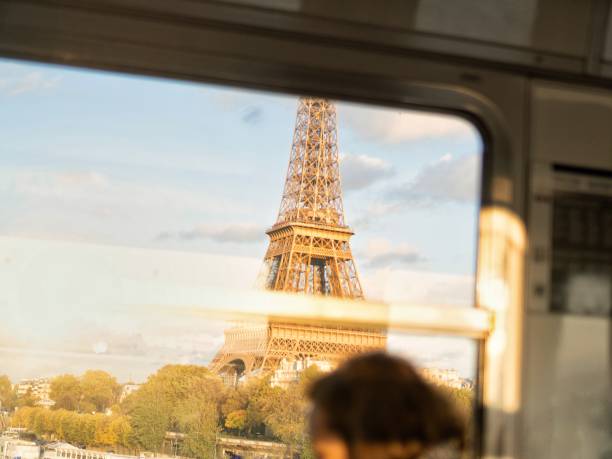 The Eiffel Tower in France seen through a subway window.