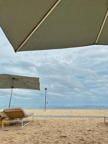 istock Beach umbrella on Bali beach. 2169248951