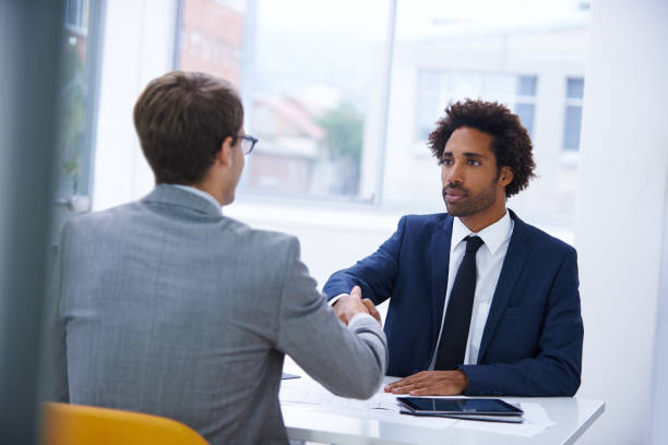 istock Business, man and hand shake at office for welcome with partnership or congratulations on corporate deal. Meeting, thank you and opportunity with support or agreement for teamwork and collaboration 2169258123