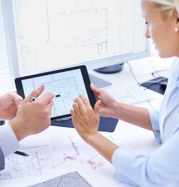 istock Tablet, blueprint screen or woman with engineer planning in meeting for engineering project progress. Architecture strategy, teamwork or hands on technology with digital app or floor plan development 2169258223