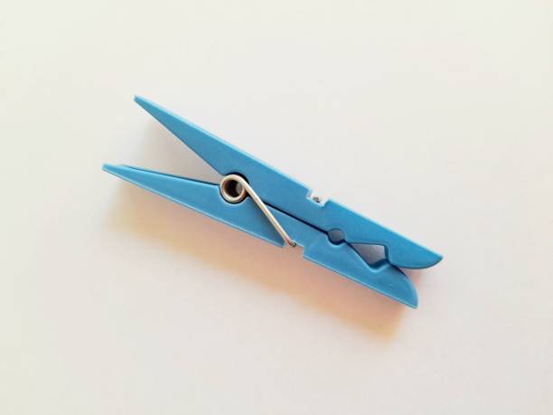 istock One blue plastic clothespin isolated with white background 2169260211
