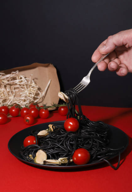 istock black pasta with mussels 2169263732