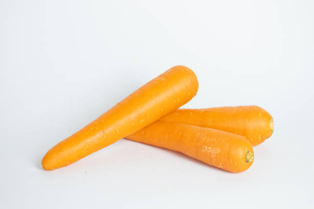The carrot Daucus carota subsp. sativus is a root vegetable, typically orange in color, though heirloom variants including purple, black, red, white, and yellow cultivars existall of which are domesticated forms of the wild carrot, Daucus carota,