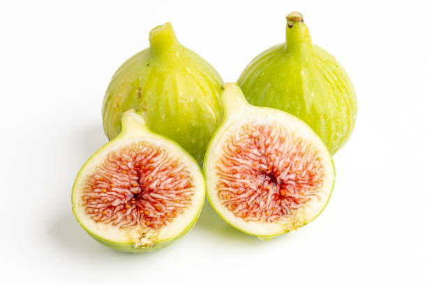 istock Many fresh green figs as background, closeup 2169265623