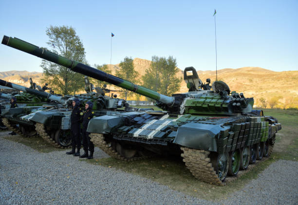 Qubadli, Azerbaijan: line of T-72 tanks - The T-72 is a Soviet main battle tank that was built by the Uralvagonzavod company from 1972 and put into service by the Soviet Army. In addition to the Soviet Union, the tank was built in Poland, Czechoslovakia, Yugoslavia, and India. The T-72 is currently the most widely used main battle tank in the world.