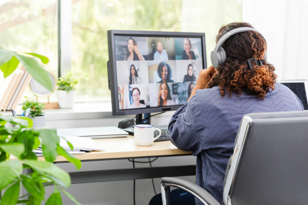 istock Unrecognizable woman listens in on virtual meeting 2169270909