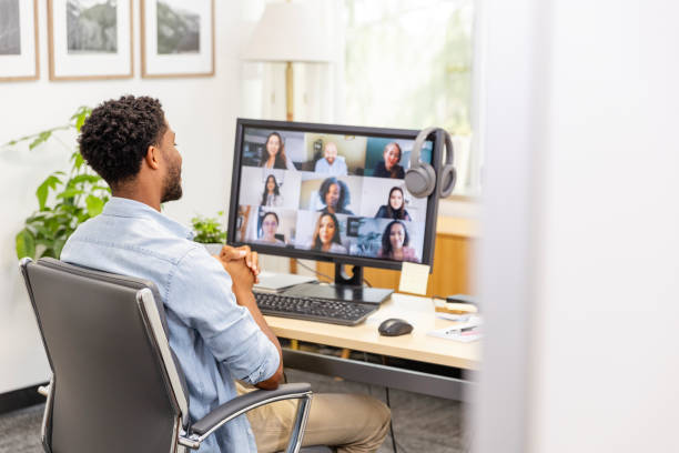 istock Unrecognizable man clasps hands and gives opinion during virtual meeting 2169270969