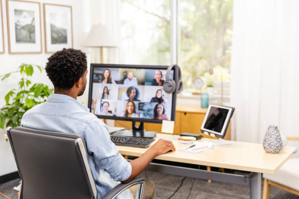 istock Unrecognizable man uses desktop PC in home office for meeting 2169270987