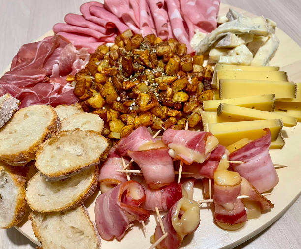 istock Appetizer platter with cheese and pork cold cuts 2169274911