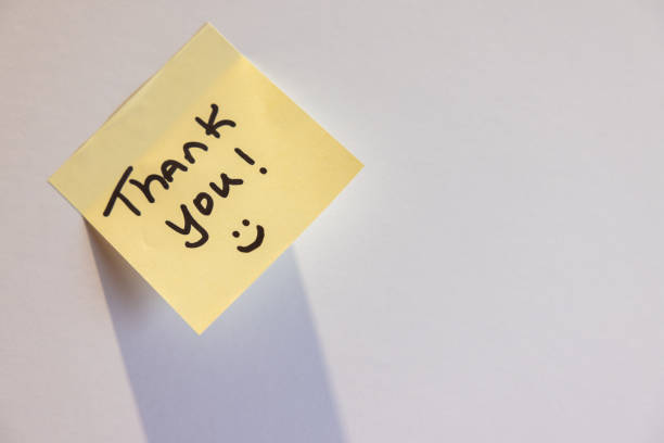 A yellow sticky note with the words \