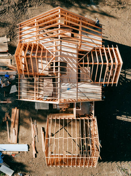 istock Construction Crew Putting Up Framing of New Home 2169277260