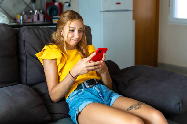 istock Student studying online with phone, focused and determined 2169282256