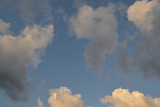istock Fluffy summer clouds with the scale of shadows. 2169282589