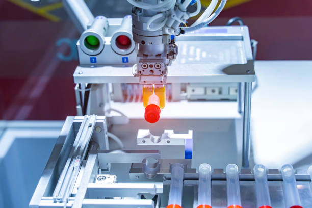 istock Robot arm with test tube for biological experiments in laboratory 2169283194