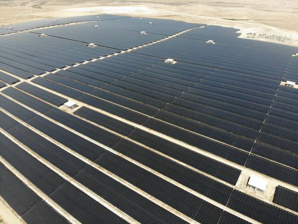 istock Solar panels power station desert aerial view 2169283994