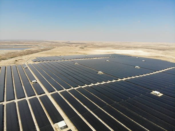 istock Solar panels power station desert aerial view 2169284046
