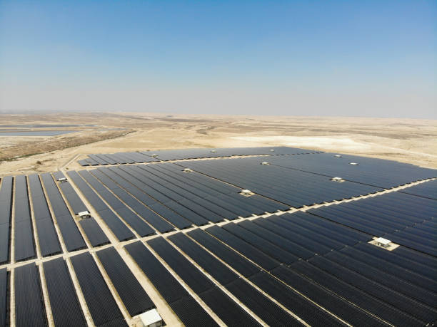 istock Solar panels power station desert aerial view 2169284115