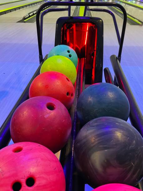 istock Neon Bowling balls on alley. 2169287429
