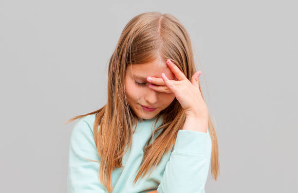 istock Bothered and pressured good-looking female feeling troubled and loaded with work making facepalm gesture exhaling and pouting lifting eyelids up from irritation and exhaust over gray background 2169292439