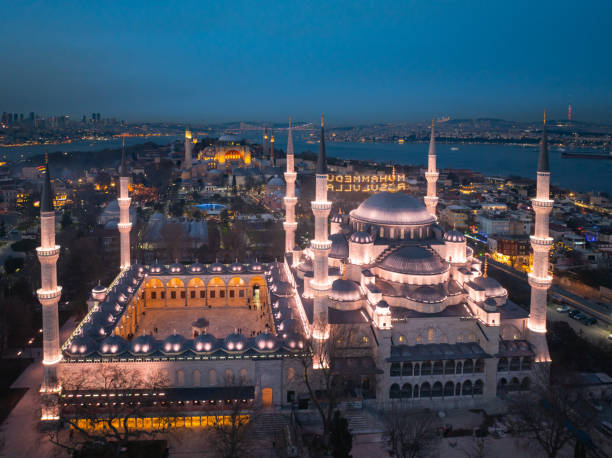 istock Blue Mosque (Sultanahmet Camii) Illuminated Letters Between Ramadan Month Minarets (Mahya) Drone Photo,  Sultanahmet Square Fatih, Istanbul Turkiye (Turkey) 2169293548