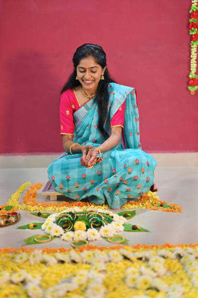 istock Bride-to-be is seen wearing green bangles during her pre wedding bangle ceremony 2169293916