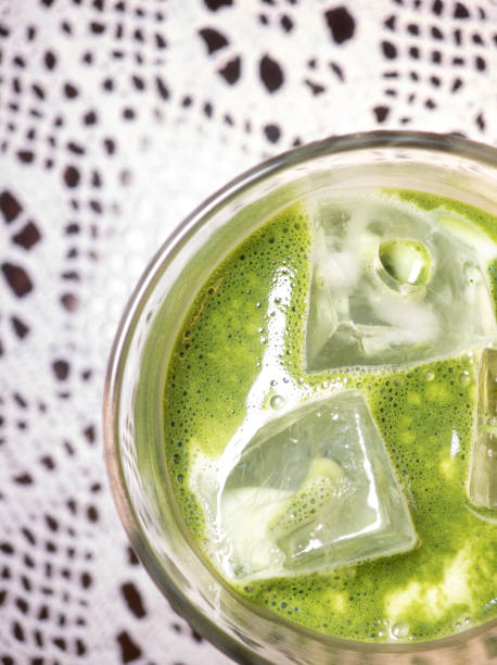 istock Frozen matcha drink in glass on table 2169294709
