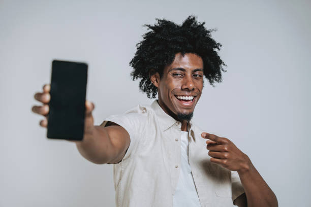 istock Portrait of a man using a smartphone 2169294863