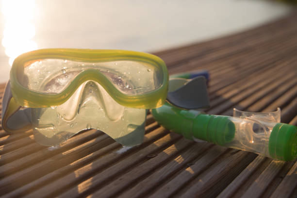 istock Snorkeling mask and snorkel on the beach. 2169300432