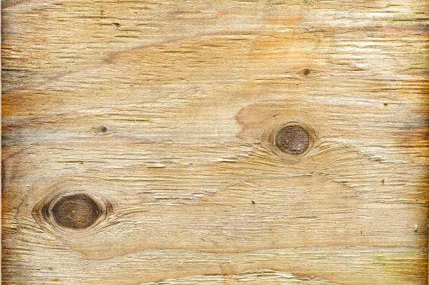 istock Natural wooden texture showcasing intricate grain patterns and knots in warm hues under soft lighting for artistic projects and designs 2169309596