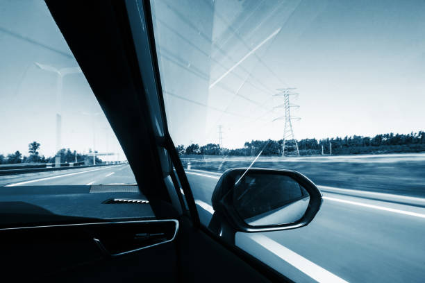 istock Speeding on the highway, blurred motion background captured from inside a car. 2169313677