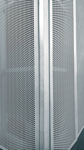istock Abstract view of a perforated aluminum corner panel 2169330438