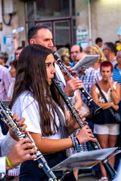 Toro, Zamora-Spain, August 24, 2024; Woman playing saxophone in the streets of the city ,Parade of floats in Toro , Zamora - Spain.