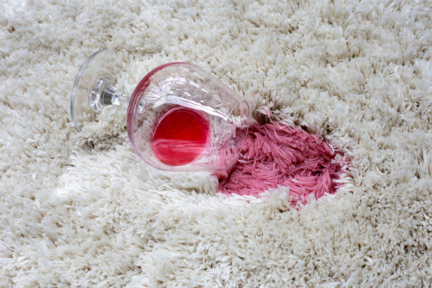 istock Red wine spilled on carpet, Wine stain 2169345232