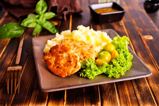 chicken cutlet from minced meat with mashed potato on plate