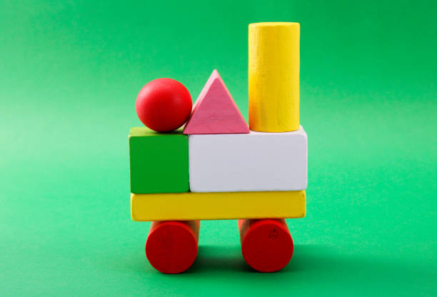 Geometric figures with different shapes and colors in balance