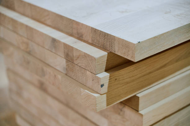 istock Wooden Parts and Boards Stored in Warehouse Ready for CNC Machine Processing 2169358582