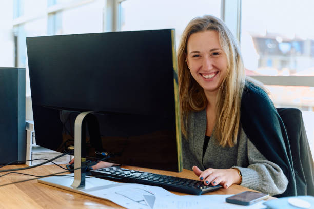 istock Businesswoman Programming a Product Design for Wood Processing Machine in Modern Office 2169359063