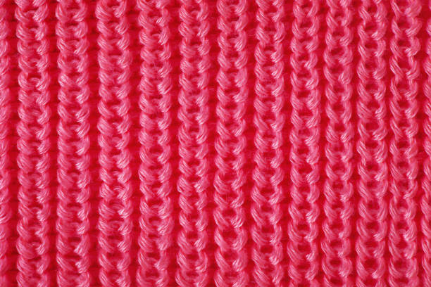 istock Knitted texture as background in pink color 2169359488