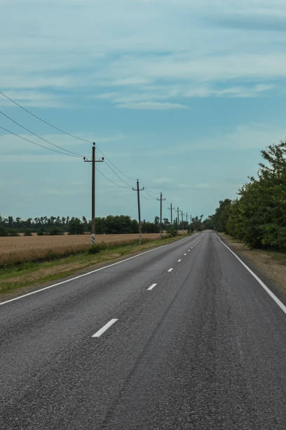 istock A country road with electric poles 2169359941
