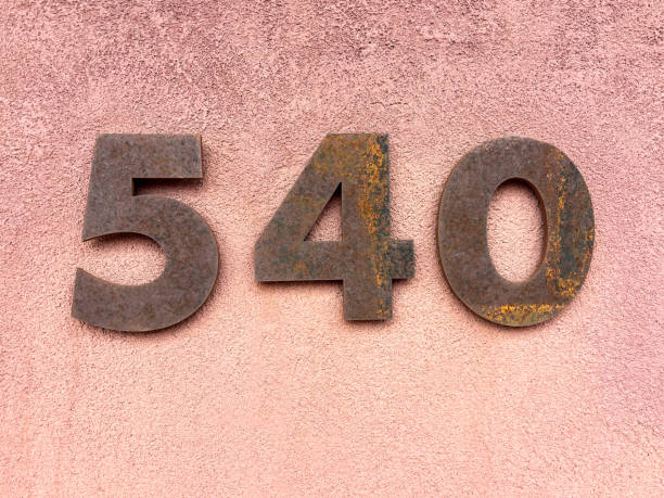 istock Rusty Number 540 Street Address on Pink Wall 2169360540