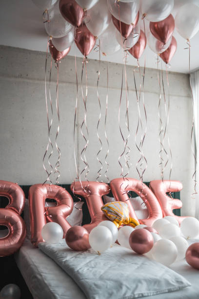 istock Bachelorette Balloon Decorations Gracefully Adorning a Hotel Bed 2169361645