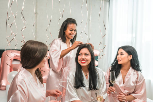 istock Diverse Bridesmaids and Hispanic Bride with Champagne 2169361660