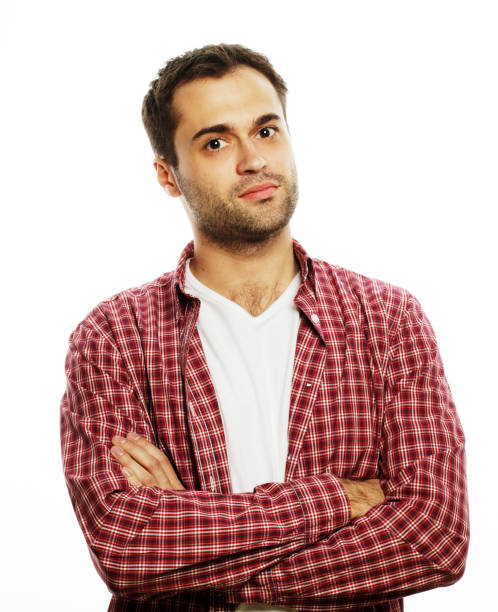 istock Handsome young man in shirt looking at camera 2169362048