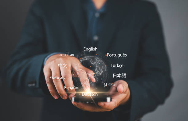 istock Translator app, language course and e-learning concept. Person use smartphone with Translator app, translation or translate on the mobile app worldwide language conversation speaking concept. 2169365015