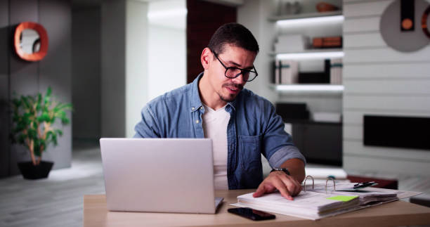 istock Calculating Finances Online Using Laptop. Tax,Budget 2169374311