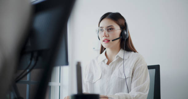 istock Customer service agent is providing advice to a customer calls at a call center. 2169375108