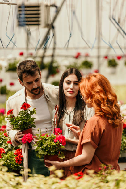 istock Couple buying flowers 2169379879