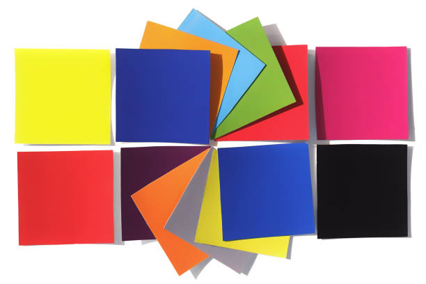 The color science education with printed paper color samples. Solid colored samples for design ideas. The set of paper labels on white background.